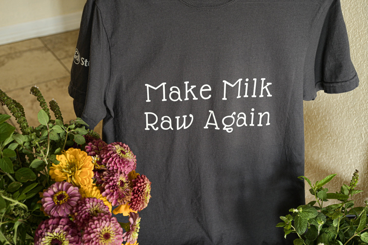 Make Milk Raw Again Unisex T-Shirt with Steader Logo